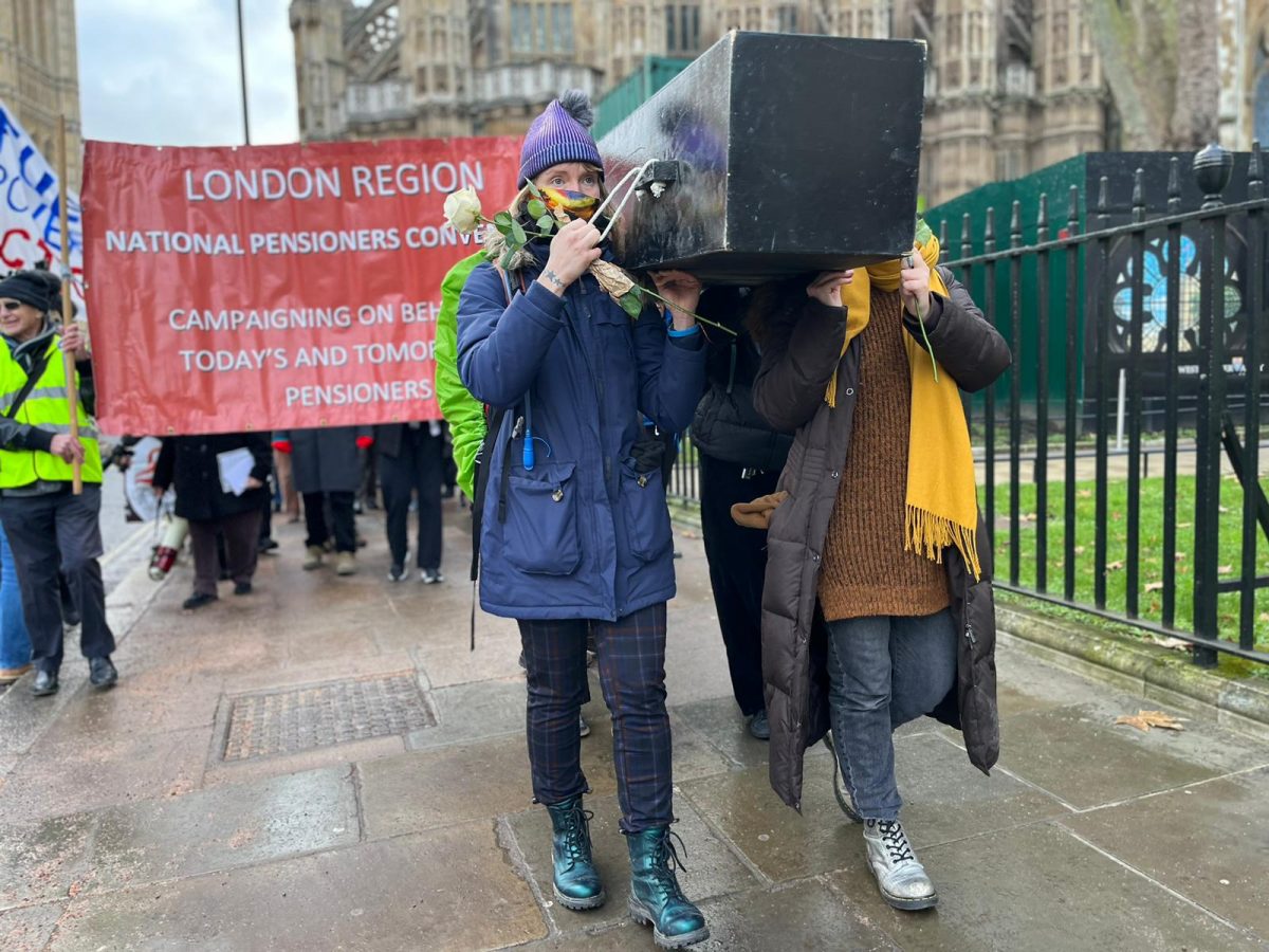 National Pensioners Convention supporters hold a vigil to mark the number of excess winter deaths announced